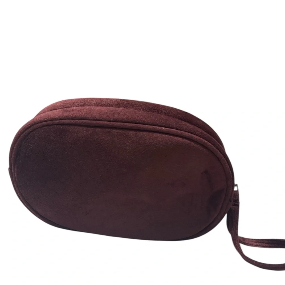 SUEDE QUILTED MINI PEARL EMBOSSED WRISTLET CLUTCH